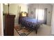 Cozy bedroom with sports themed bedspread and rug at 3299 Arbor Oaks Dr, Snellville, GA 30039