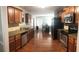Spacious kitchen with stainless appliances, granite counters, wooden cabinets, and hardwood floors at 3299 Arbor Oaks Dr, Snellville, GA 30039