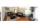 Spacious living room with a cozy fireplace, hardwood floors, and ample seating at 3299 Arbor Oaks Dr, Snellville, GA 30039