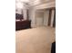 Expansive primary bedroom with plush carpet, tray ceiling and ensuite access at 3299 Arbor Oaks Dr, Snellville, GA 30039