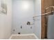 Utility room with tile floor, gray walls, and water heater at 3918 S Creek Ct, Stone Mountain, GA 30083