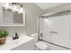 Well-lit bathroom with modern fixtures, shower and vanity at 558 Newlin Ct, Lawrenceville, GA 30046