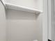 This walk-in closet provides ample storage space with an integrated rod system for easy organization at 558 Newlin Ct, Lawrenceville, GA 30046