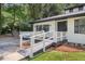 Inviting home featuring a convenient ramp leading to the front door at 558 Newlin Ct, Lawrenceville, GA 30046