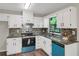 Beautiful kitchen with stainless steel appliances, tiled backsplash, and plenty of counter space at 558 Newlin Ct, Lawrenceville, GA 30046