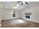 Spacious living room with high ceilings, skylight and a modern fireplace at 558 Newlin Ct, Lawrenceville, GA 30046
