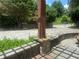 Fenced backyard with gravel surface offering space and privacy at 1570 Cedars Rd, Lawrenceville, GA 30045