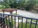 Backyard oasis featuring a pergola, fire pit, and lush greenery for outdoor enjoyment at 1570 Cedars Rd, Lawrenceville, GA 30045