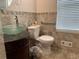Bathroom features modern fixtures, a glass bowl sink, and tiled accents at 1570 Cedars Rd, Lawrenceville, GA 30045