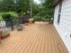 Spacious wooden deck with black railings, ideal for outdoor entertaining and relaxation at 1570 Cedars Rd, Lawrenceville, GA 30045