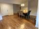 Charming dining room with hardwood floors and an elegant chandelier at 1570 Cedars Rd, Lawrenceville, GA 30045