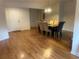 Charming dining room featuring hardwood floors and a stylish dining set at 1570 Cedars Rd, Lawrenceville, GA 30045