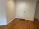 Entryway with hardwood floors and a white door at 1570 Cedars Rd, Lawrenceville, GA 30045