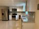 Bright kitchen with modern appliances, granite countertops, and ample cabinet space at 1570 Cedars Rd, Lawrenceville, GA 30045