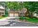 Charming brick home with a two-car garage and well-maintained front yard at 3747 Sturbridge Ct, Tucker, GA 30084
