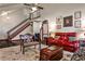 Bright and airy living room with hardwood floors and a staircase leading to the upper level at 3747 Sturbridge Ct, Tucker, GA 30084