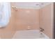 This bathroom has a white shower and a bathtub at 4077 Phils Ct, Tucker, GA 30084