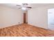 Cozy bedroom featuring hardwood floors and a ceiling fan at 4077 Phils Ct, Tucker, GA 30084