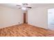 Spacious bedroom features hardwood floors, a ceiling fan and lots of natural light at 4077 Phils Ct, Tucker, GA 30084
