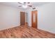 Comfortable bedroom offering hardwood floors and natural light streaming through the doorway at 4077 Phils Ct, Tucker, GA 30084