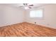 This bedroom includes wooden floors and lots of natural light at 4077 Phils Ct, Tucker, GA 30084