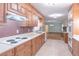 Spacious kitchen featuring modern appliances and wooden cabinets at 4077 Phils Ct, Tucker, GA 30084