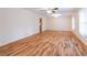 Bright and spacious living room featuring hardwood floors and a ceiling fan at 4077 Phils Ct, Tucker, GA 30084