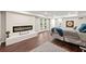 Basement bedroom with a fireplace, dark wood flooring, and recessed lighting at 4555 Holliston Rd, Dunwoody, GA 30360