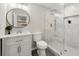 Bathroom with stand up shower, vanity with sink and neutral paint at 4555 Holliston Rd, Dunwoody, GA 30360