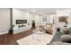 Comfortable living room with a modern fireplace, cozy seating, and elegant decor at 4555 Holliston Rd, Dunwoody, GA 30360