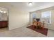 This multi purpose room features a table and chairs and adjoins a bathroom at 8295 Village Pl, Suwanee, GA 30024