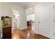 Welcoming entryway with hardwood floors, leading to the living spaces at 8295 Village Pl, Suwanee, GA 30024