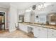 Luxury bathroom features a double vanity, granite counters, a large mirror, and a separate shower at 1140 River Laurel Dr, Suwanee, GA 30024