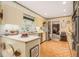 Traditional kitchen with tile floor, cream colored cabinets, and stainless steel appliances at 2221 Fairoaks Rd, Decatur, GA 30033