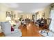 Bright and airy living room featuring hardwood floors, classic furnishings, and ample natural light at 2221 Fairoaks Rd, Decatur, GA 30033