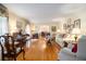 Spacious living room with gleaming hardwood floors, traditional decor, and an open floor plan at 2221 Fairoaks Rd, Decatur, GA 30033
