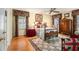 This spacious main bedroom features hardwood floors, large windows, and vintage decorations at 2221 Fairoaks Rd, Decatur, GA 30033