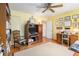 Functional home office with built-in shelving, wood floors, and a dedicated desk area at 2221 Fairoaks Rd, Decatur, GA 30033
