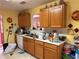 Well-lit kitchen with oak cabinets and plenty of counter space at 4206 Shoreside Cir, Snellville, GA 30039
