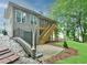Backyard featuring a patio, a deck with stairs, and green grass at 4241 Hampton Mill Pkwy, Douglasville, GA 30135