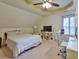 Well-lit bedroom featuring carpet, a ceiling fan, a bed, and a desk area at 4241 Hampton Mill Pkwy, Douglasville, GA 30135