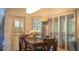 Cozy breakfast nook featuring a wooden table, comfortable seating, and natural light streaming through the windows at 4241 Hampton Mill Pkwy, Douglasville, GA 30135