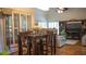 Cozy breakfast nook with a wooden table, seating for four, and ample natural light for enjoying casual meals at 4241 Hampton Mill Pkwy, Douglasville, GA 30135