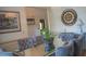 Stylish dining area featuring a glass table, comfortable seating for six, and elegant decor, perfect for entertaining guests at 4241 Hampton Mill Pkwy, Douglasville, GA 30135
