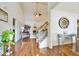 Inviting foyer with hardwood floors, high ceilings, and elegant decor at 4241 Hampton Mill Pkwy, Douglasville, GA 30135