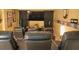 Private home theater featuring comfortable seating, a large screen, and immersive surround sound for a cinematic experience at 4241 Hampton Mill Pkwy, Douglasville, GA 30135