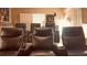 Luxurious home theater with plush seating, cup holders, and immersive entertainment for an elevated viewing experience at 4241 Hampton Mill Pkwy, Douglasville, GA 30135