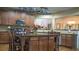 Well-equipped kitchen with stainless steel appliances, large center island, and ample cabinet space, ideal for cooking and entertaining at 4241 Hampton Mill Pkwy, Douglasville, GA 30135