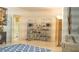 Bright living area with modern shelving, vintage audio equipment, and contemporary design offers a unique blend of styles at 4241 Hampton Mill Pkwy, Douglasville, GA 30135