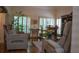 Inviting living room featuring stylish seating, large windows, and elegant decor at 4241 Hampton Mill Pkwy, Douglasville, GA 30135